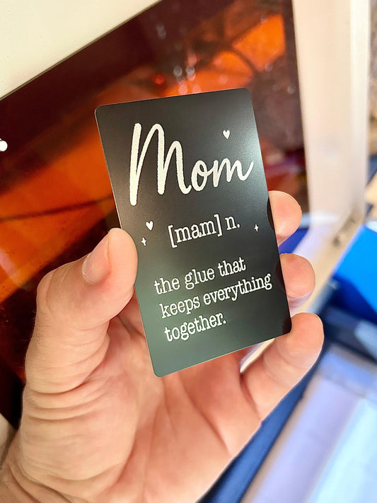 Laser engraved metal gift card with Mom definition laser engraved in black/silver anodized aluminum