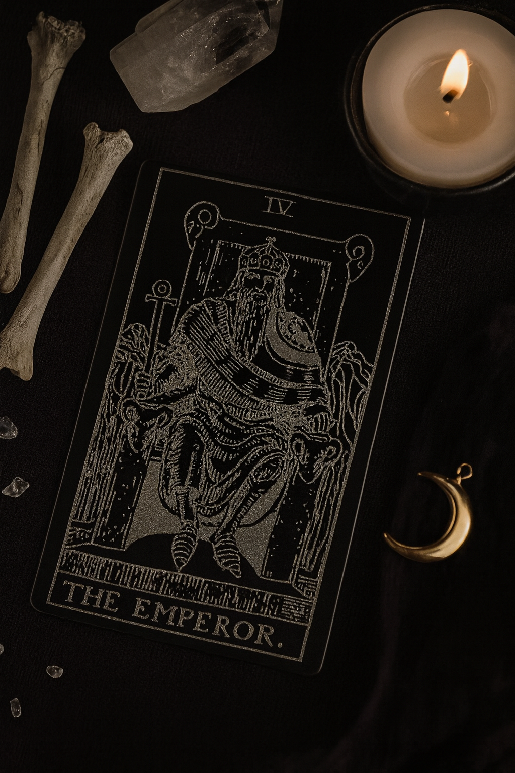 Metal keepsake with The Emperor laser engraved on anodized aluminum, photographed in a mystical dark setting