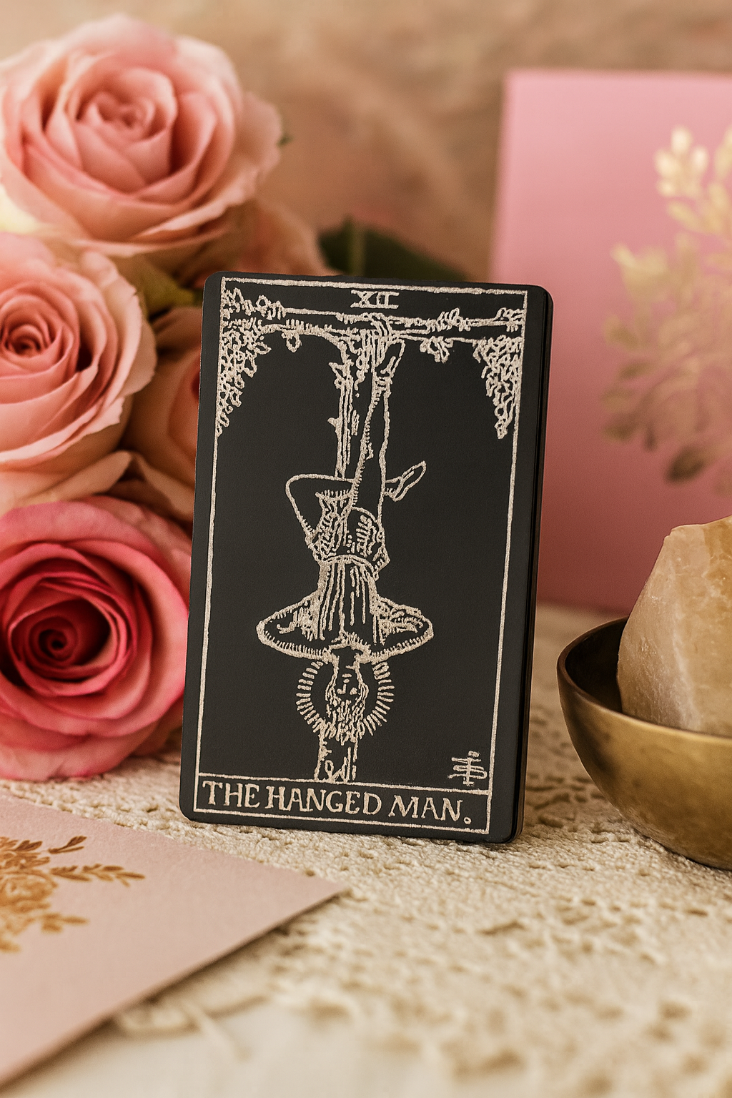 Metal Tarot card with The Hanged Man laser engraved in anodized aluminum, on matte black, choices of 9 colors on silver