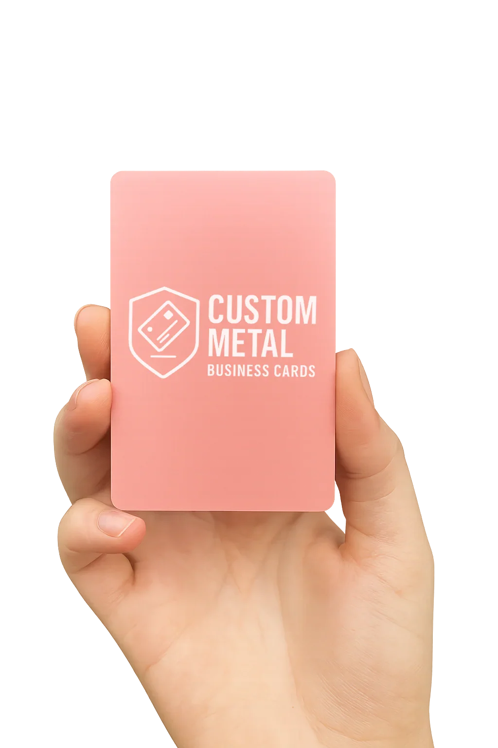 Hand holding a pink card with 'Custom Metal Business Cards' text on a white background