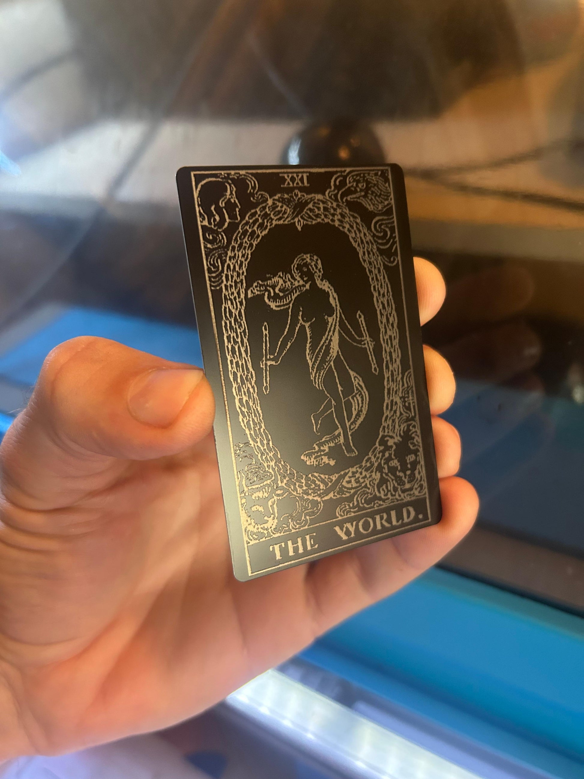 Metal "The World" laser engraved tarot card keepsake