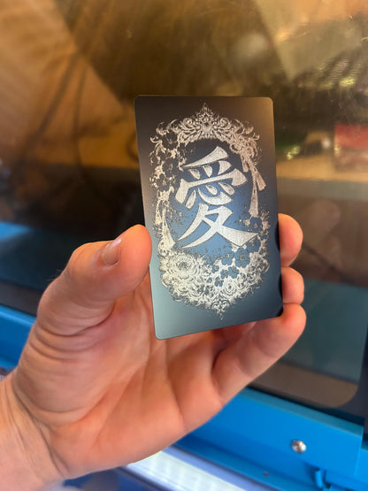 Laser engraved metal kanji romantic greeting card with floral engraving