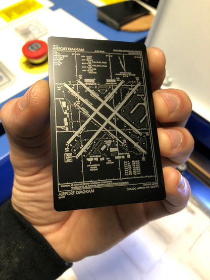 Metal airport diagram keepsake card with highly detailed laser engraving in anodized aluminum
