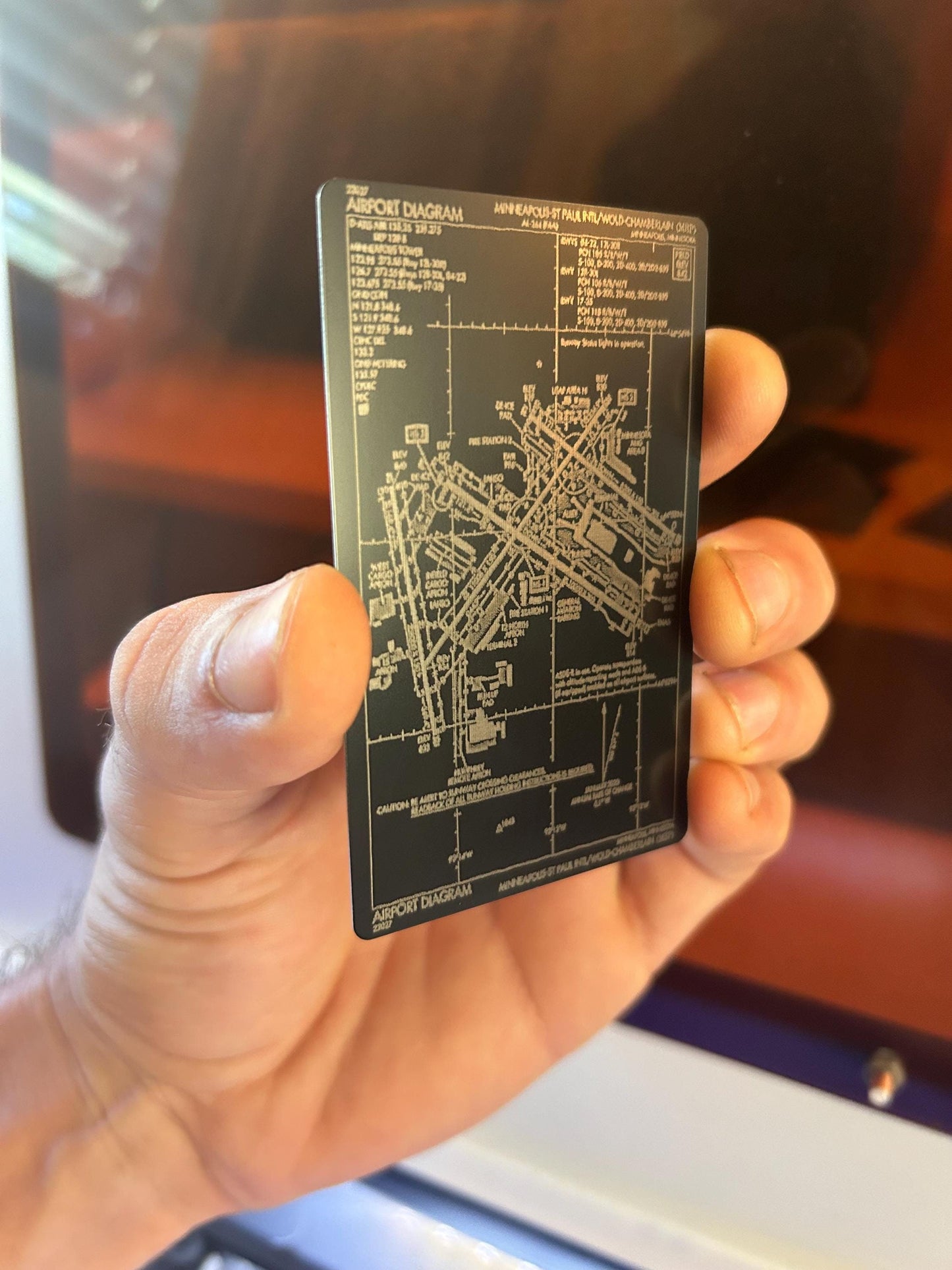 Laser engraved metal airport diagram chart in black/silver anodized aluminum