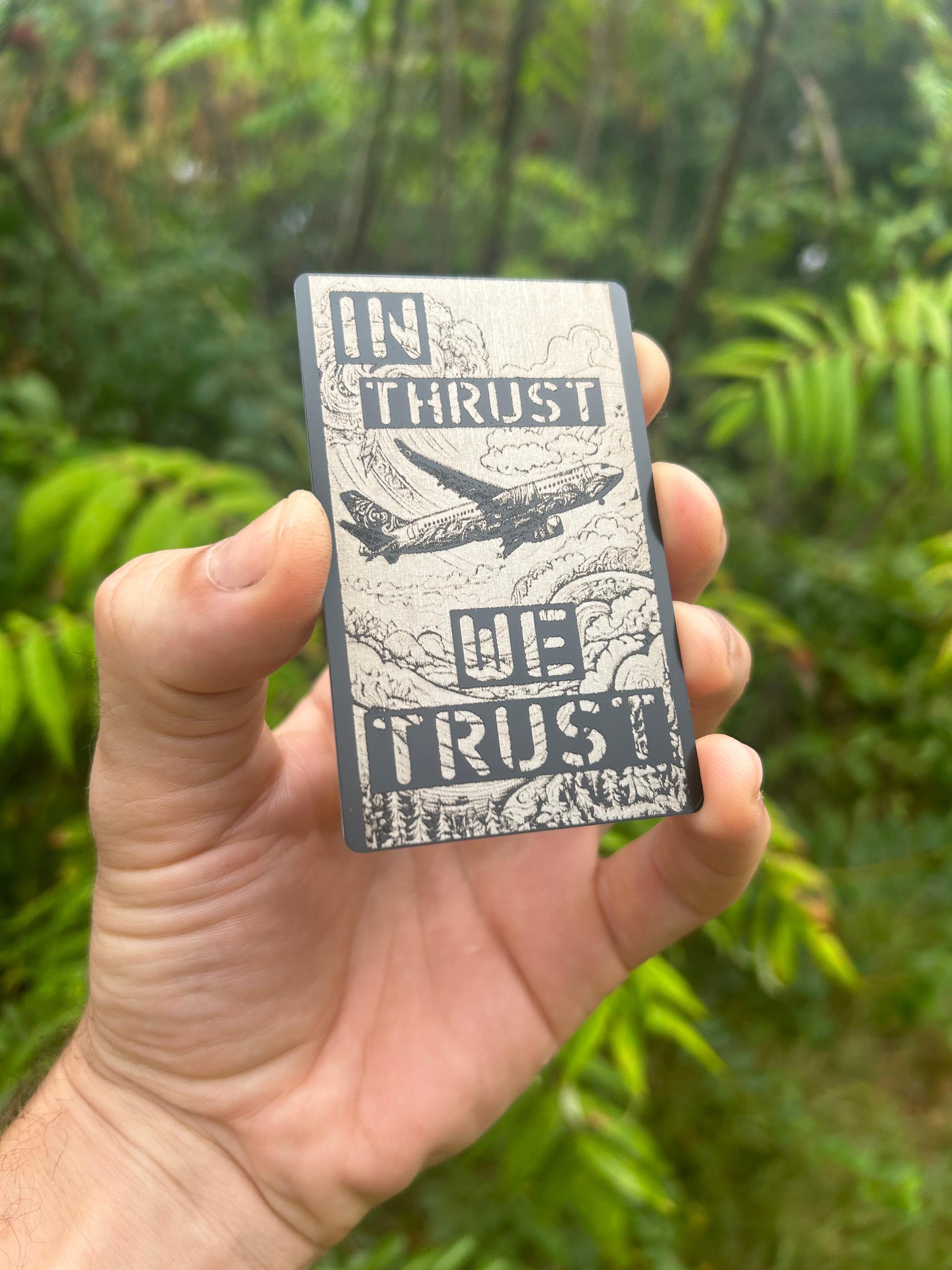 Laser engraved In Thrust We Trust aviation artwork laser engraved in anodized aluminum