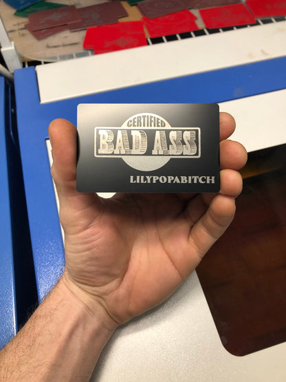 Metal Certified Bad-Ass identification badge with personalized laser engraved text below.