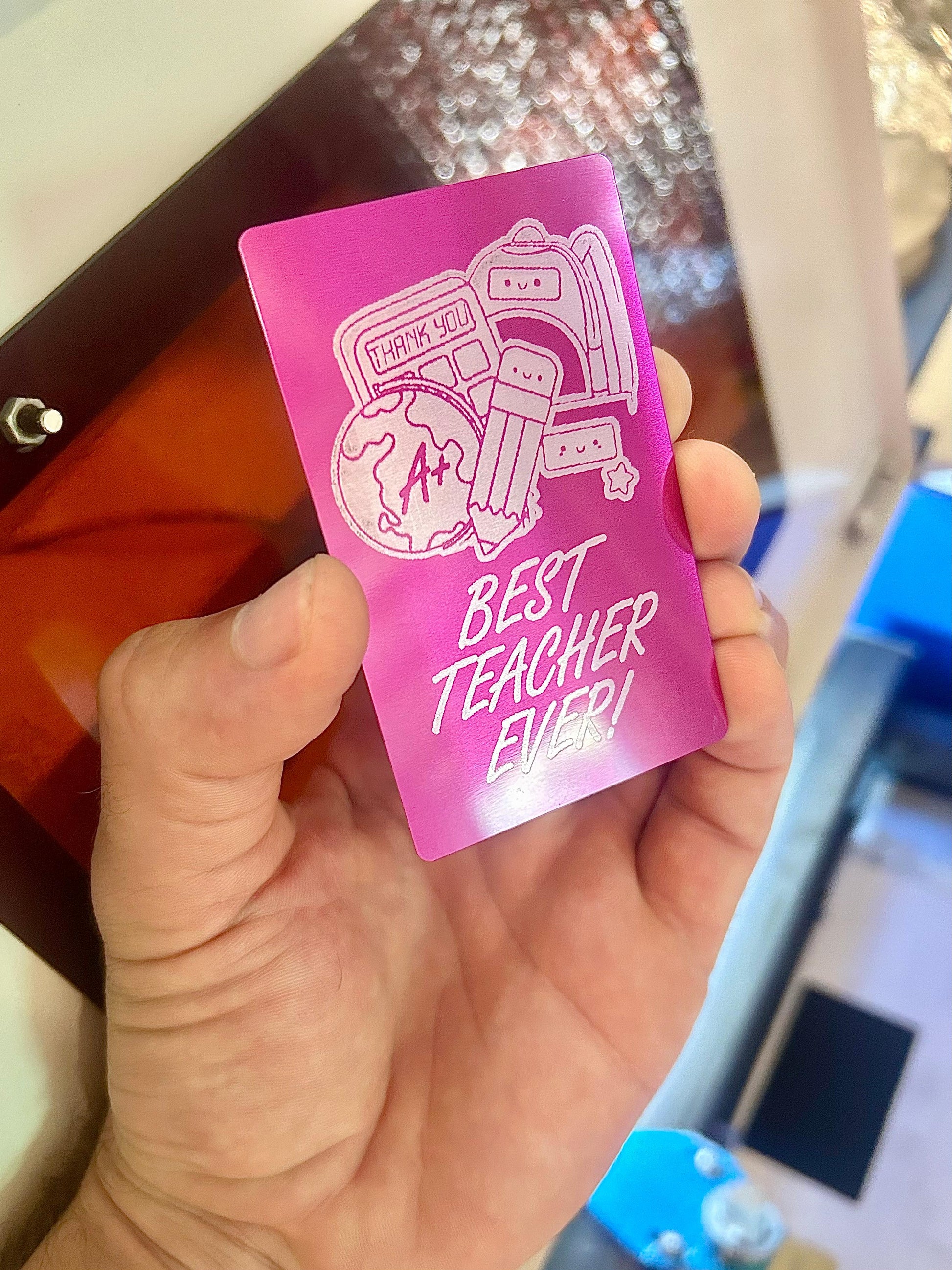 Metal Best Teacher Ever laser engraved metal gift card in purple/silver anodized aluminum