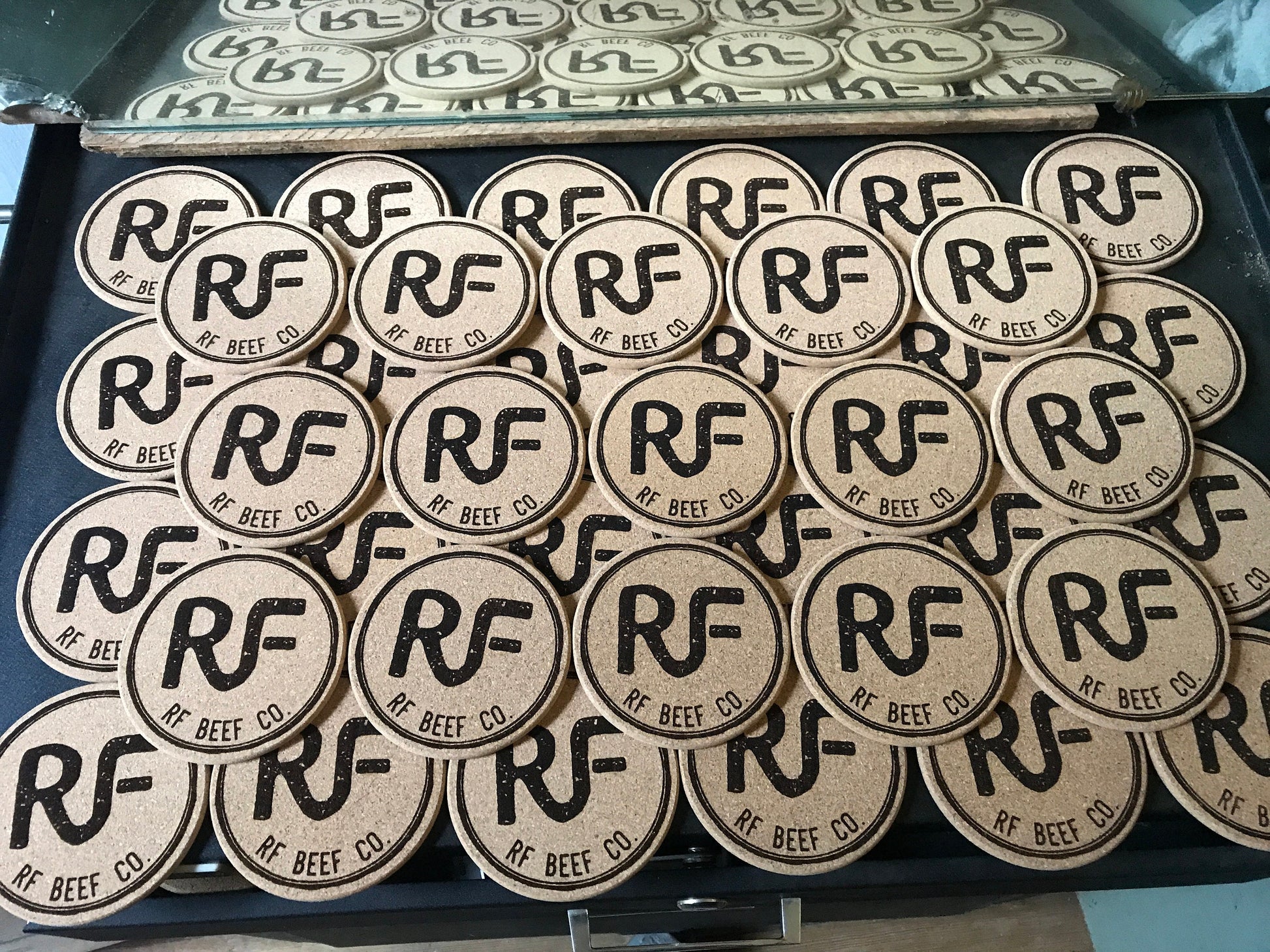 Laser engraved set of 100 cork coasters