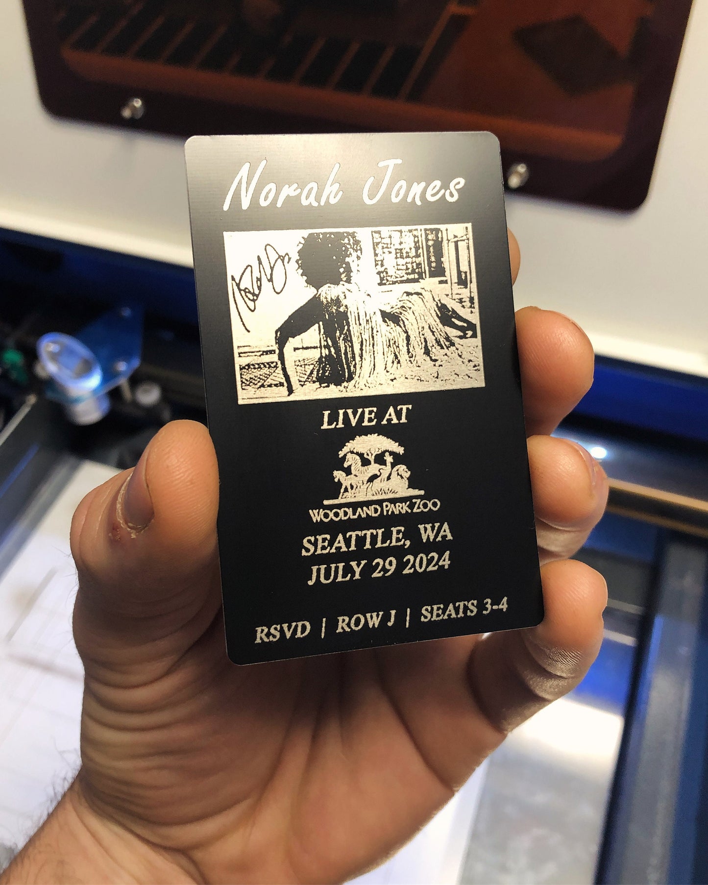 metal concert ticket, with custom design, text, logo engraving