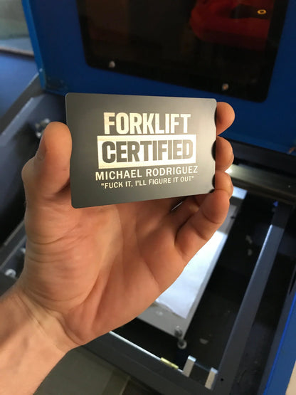 Laser engraved metal gag gift card with Forklift Certified and custom name engraving in anodized aluminum