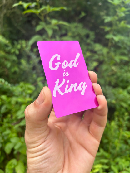 metal purple/silver card with 'God is King' faith inspired engraving