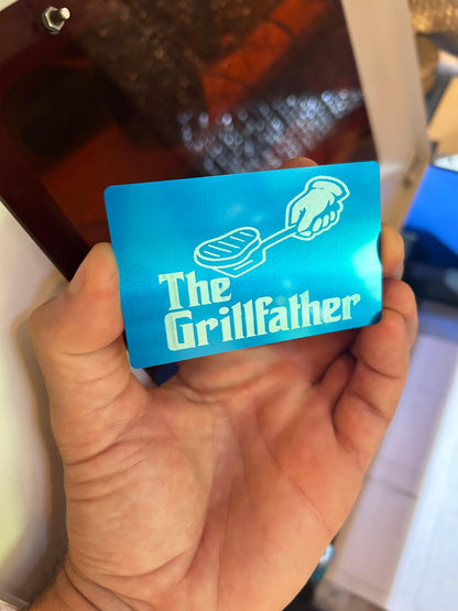 Metal father's day card with The Grillfather graphic in blue/silver