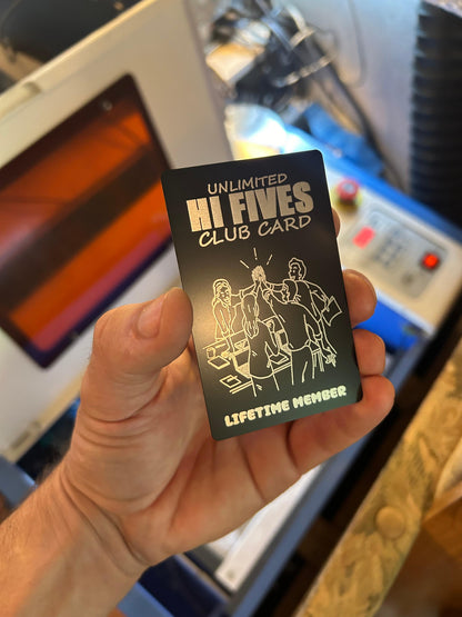 Funny metal gift card with "Unlimited Hi Fives Club Card" text, with "Lifetime Member" below, laser engraved in black/silver anodized aluminum