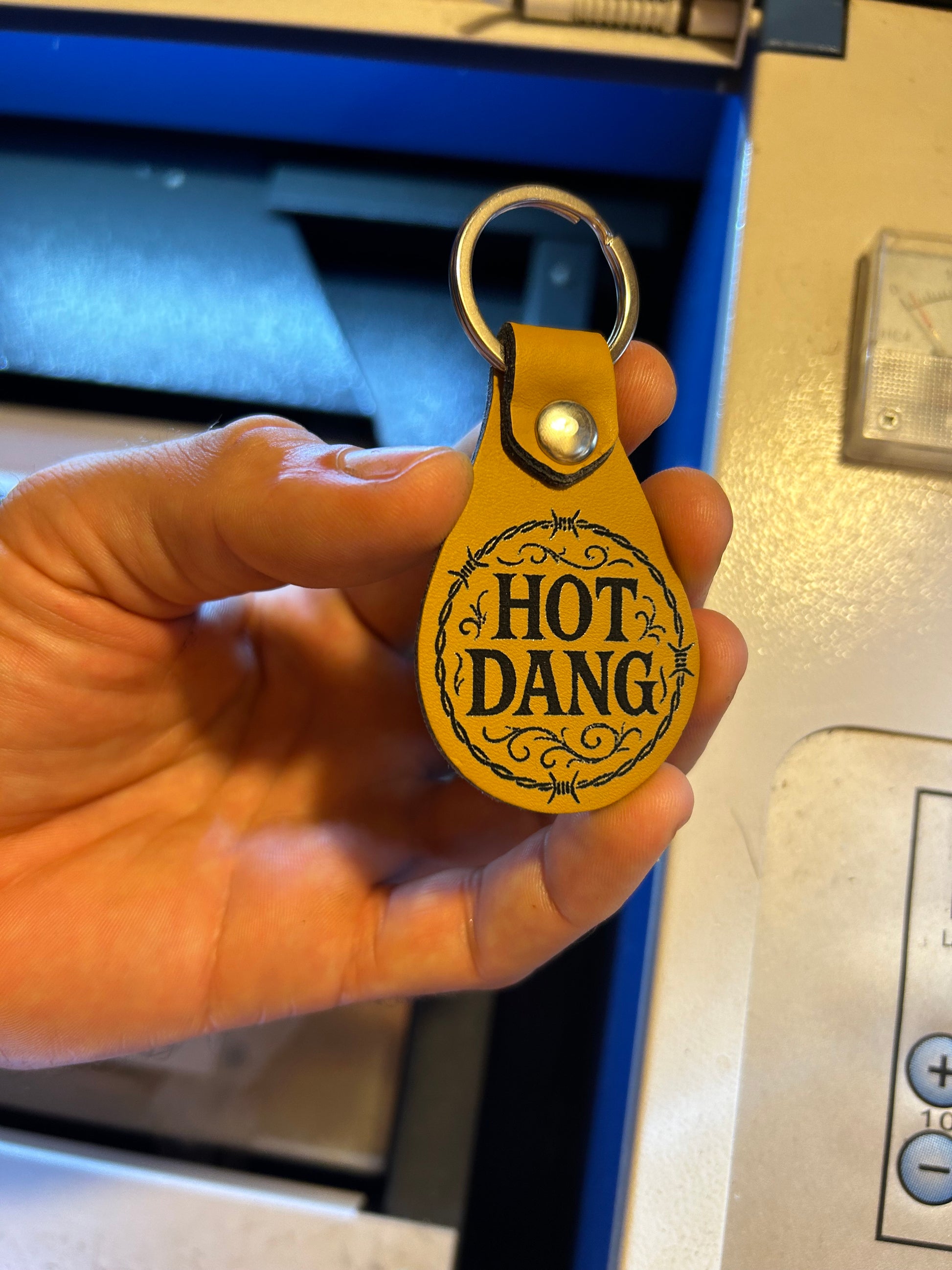 Leather hot dang keychain laser engraving