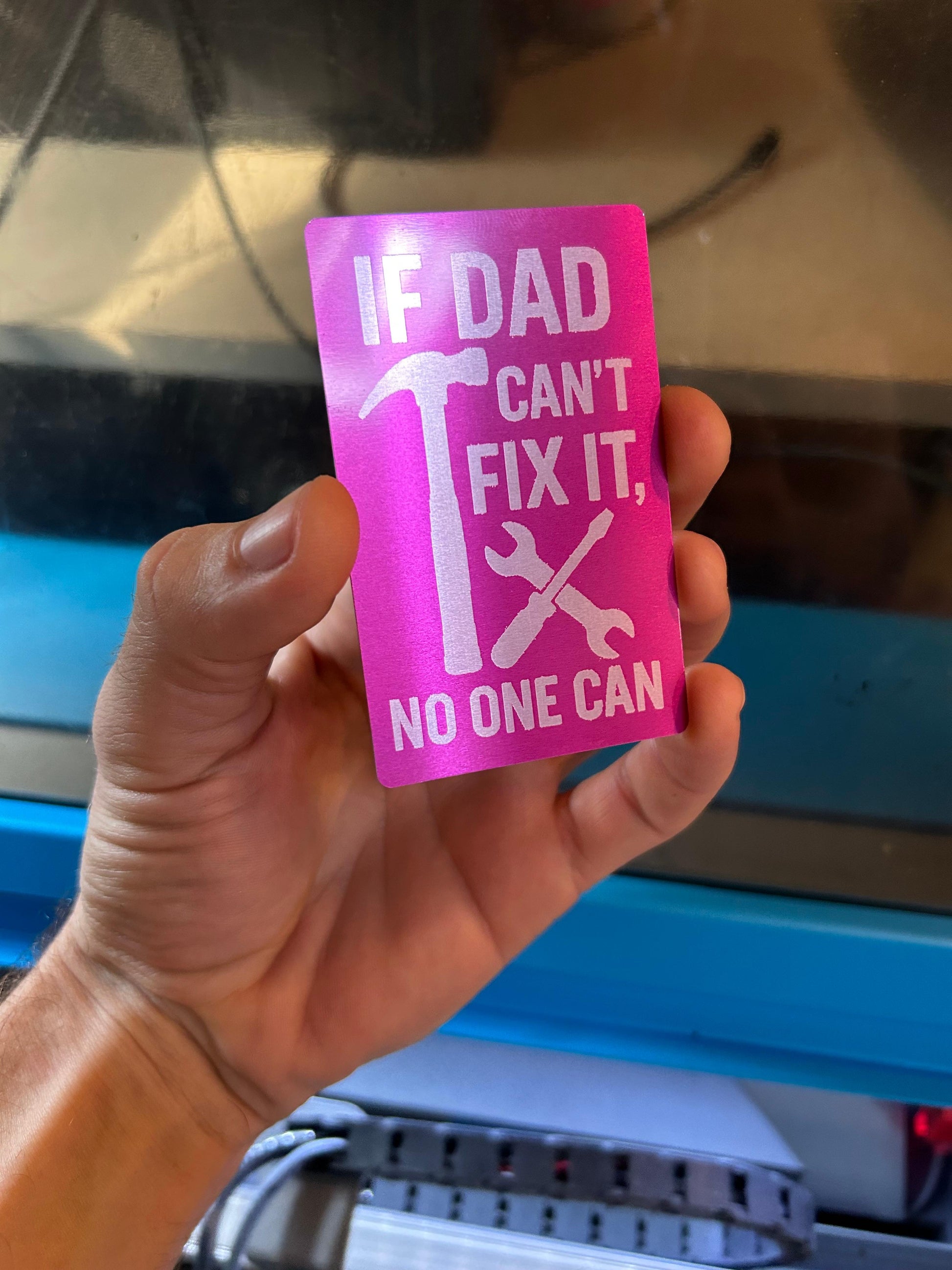 Metal keepsake card that reads "If Dad Can't Fix It, No One Can" with tools logo