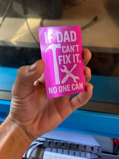Metal keepsake card that reads "If Dad Can't Fix It, No One Can" with tools logo