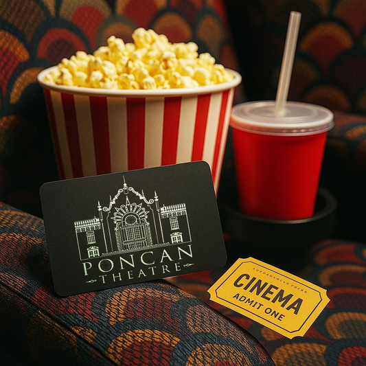 Movie theater concession stand with popcorn, drink, and custom metal Poncan Theatre card on a patterned surface