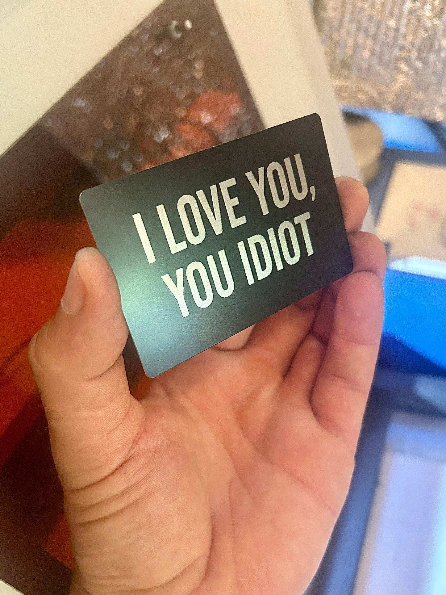 I Love You, You Idiot! Metal laser engraved funny gag gift cards for loved ones in black/silver anodized aluminum