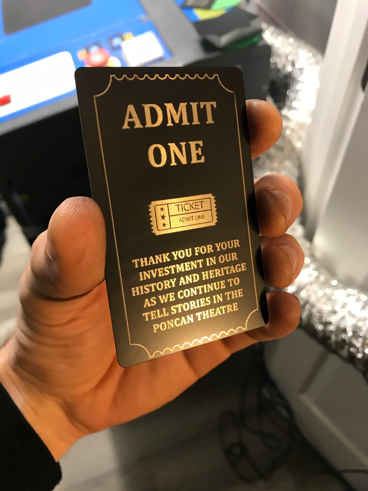 laser engraved metal admit one card with personalized text and logo