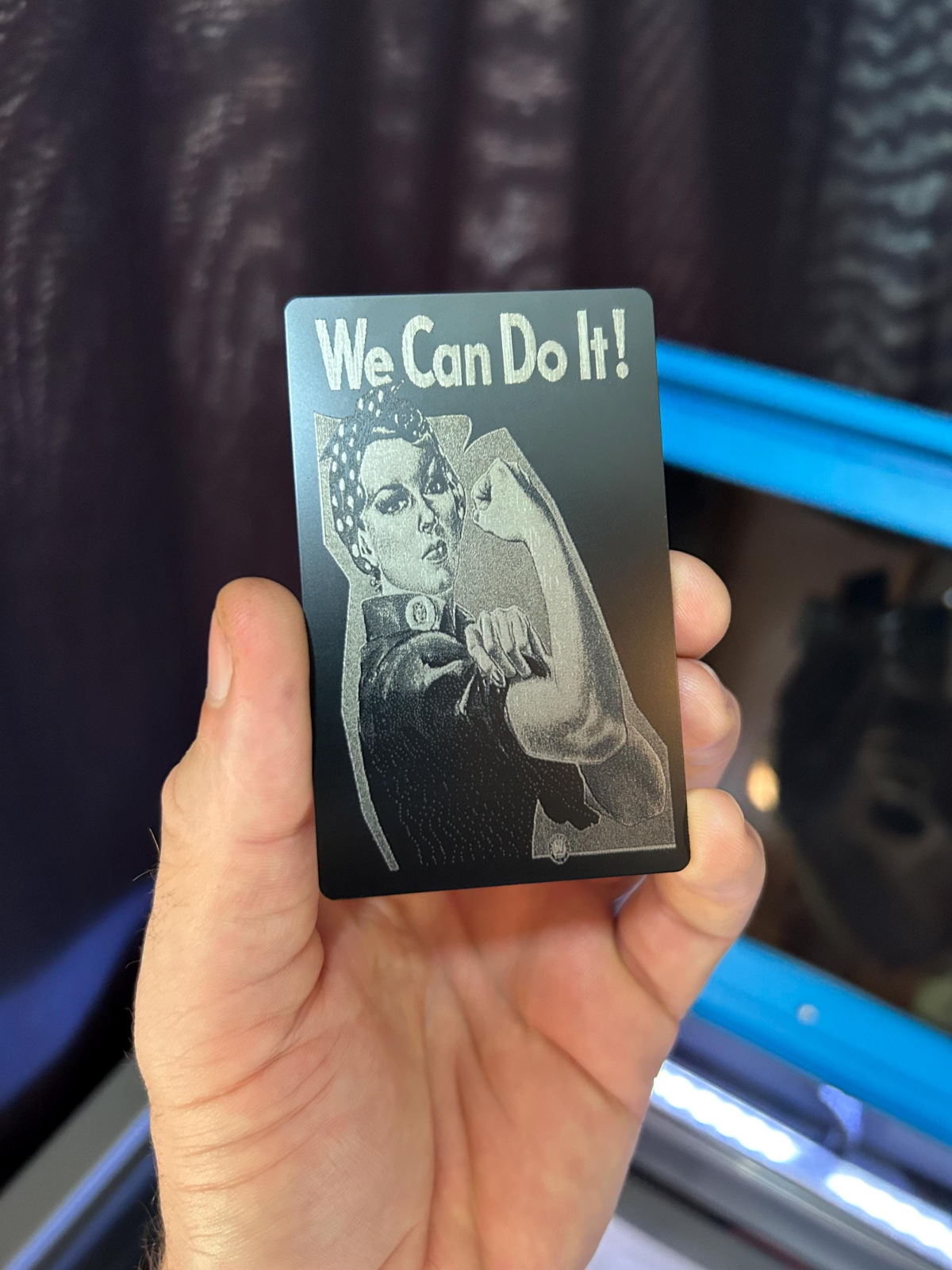 Metal keepsake card with 'We Can Do It!' Rosie the Riveter engraving