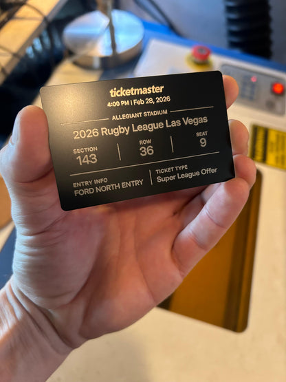 Laser engraved metal event ticketing in black/silver