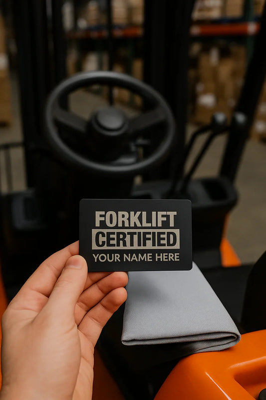 Forklift certification card held in front of a forklift in a warehouse setting