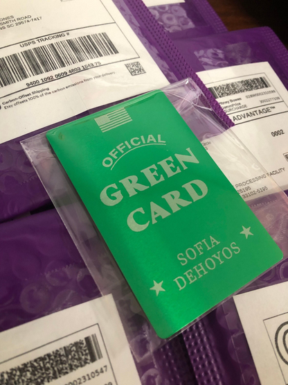 metal Green card with 'Official Green Card' text and custom name laser engraving