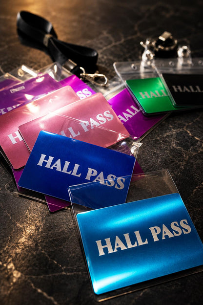 Laser engraved metal hall pass cards shown in purple, rose gold, blue, green and black anodized aluiminum