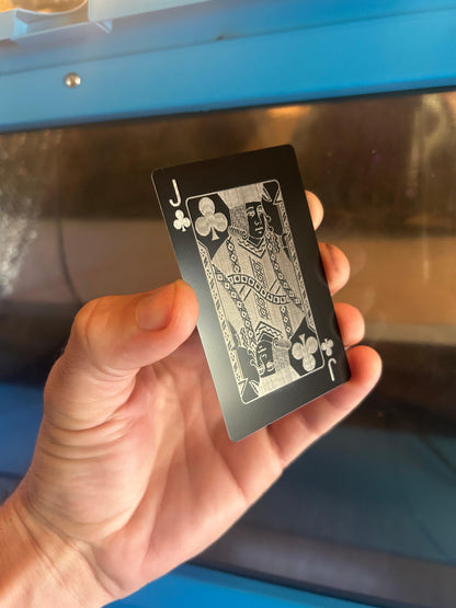 Metal poker card with Jack of Clubs engraving in black/silver