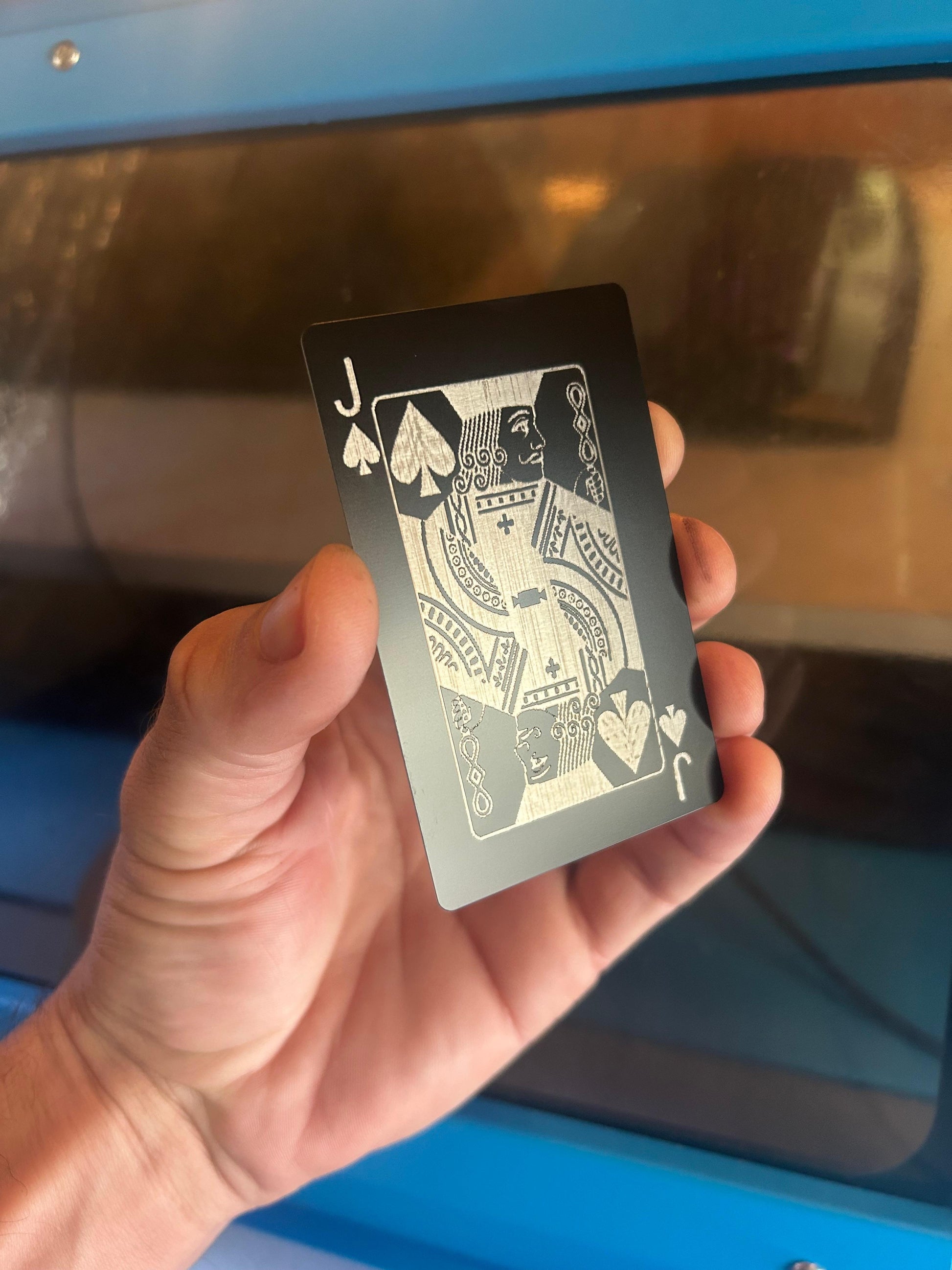 Laser engraved metal Jack of Spades card in anodized aluminum