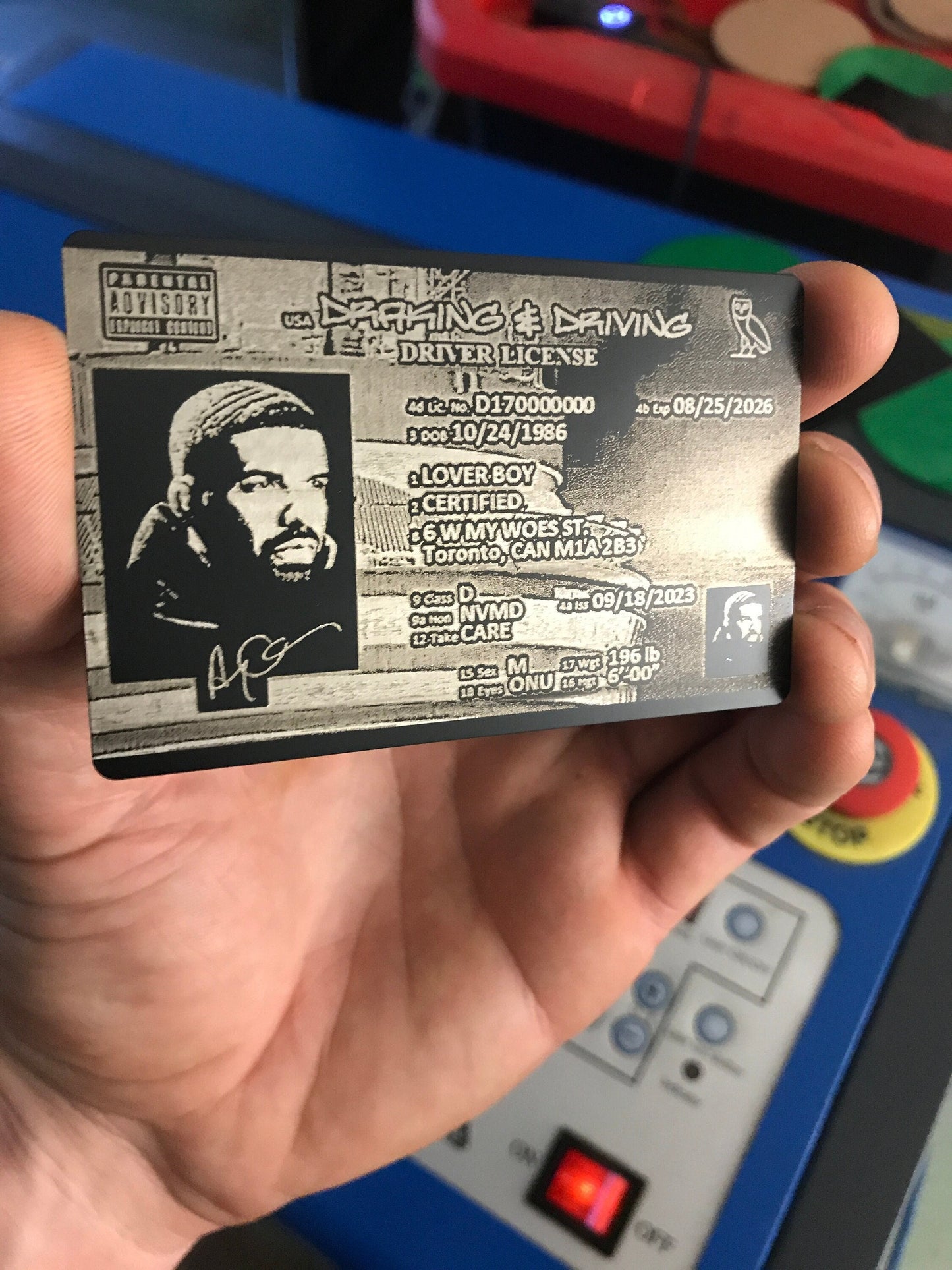 Laser engraved metal business card with novelty driver license design