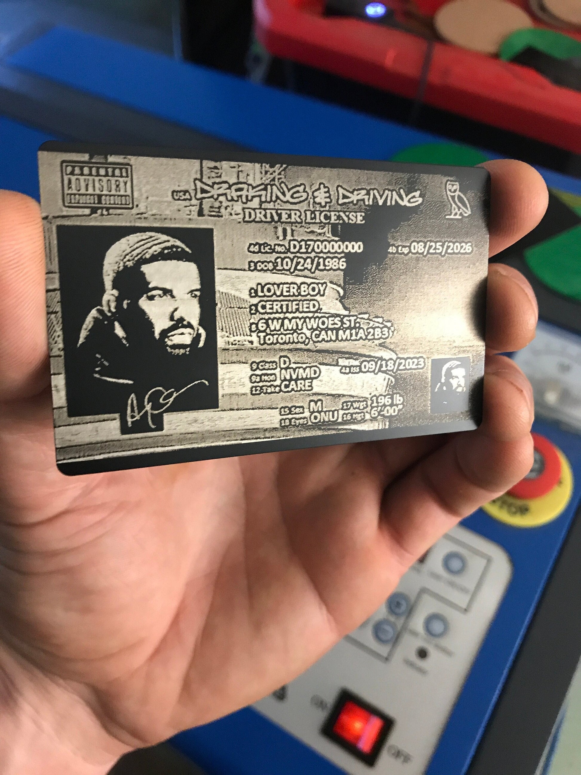 Laser engraved metal business card with novelty driver license design