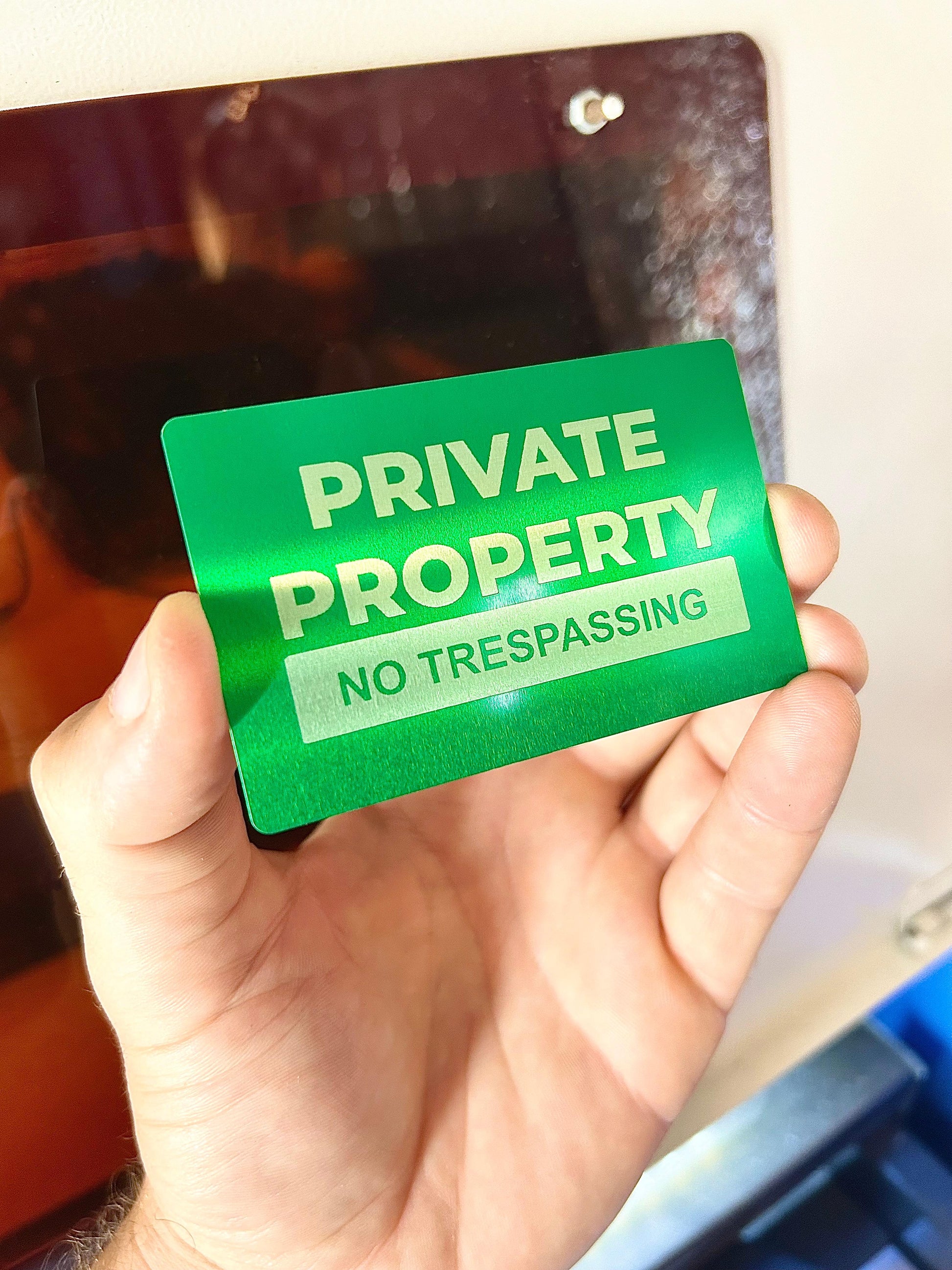 Laser engraved metal Private Property card in green/silver anodized aluminum