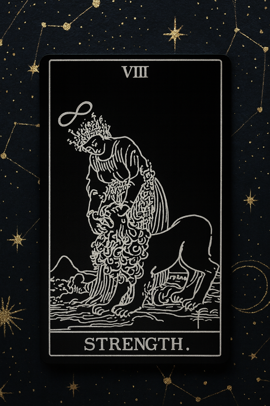 Metal tarot card featuring a lion and a woman with the word 'Strength' on a dark background with star patterns.