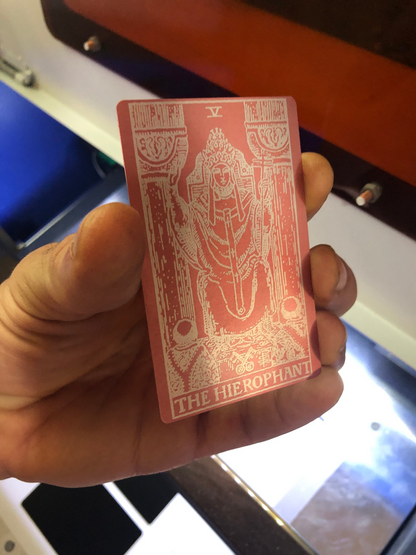 Rose gold/silver metal tarot card with intricate The Hierophant design