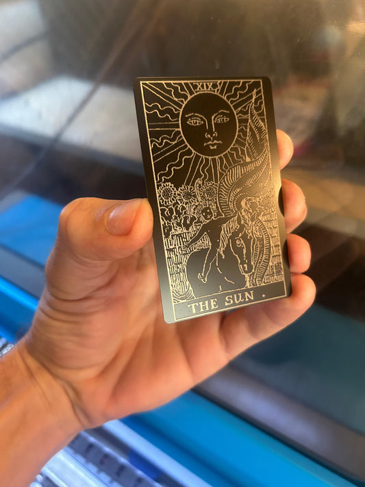 Laser engraved "The Sun" tarot card, laser engraved in anodized aluminum