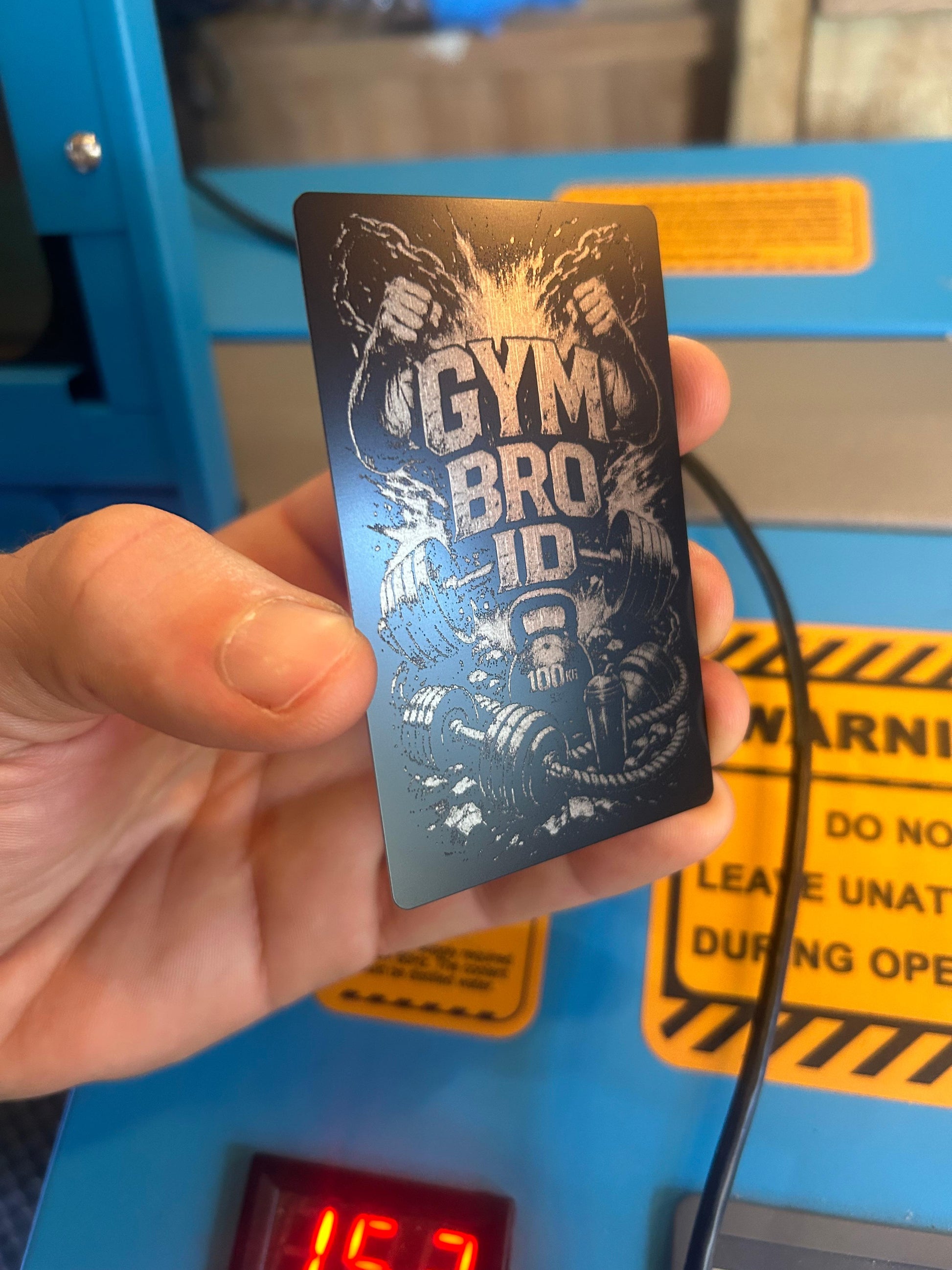 Laser engraved metal Gym Bro Identification card art