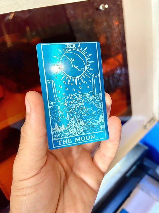 The moon tarot card laser engraved in blue/silver anodized aluminum