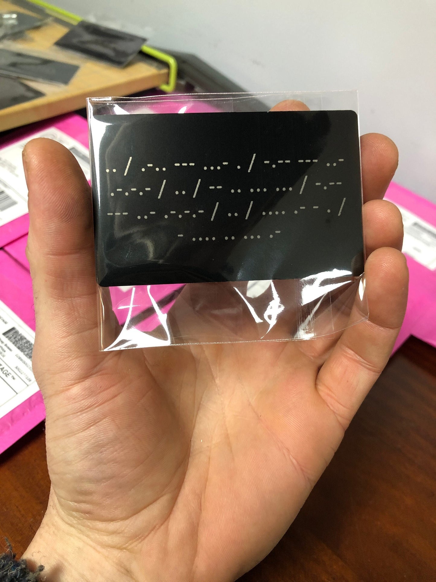 Laser engraved metal gift card with custom morse code message