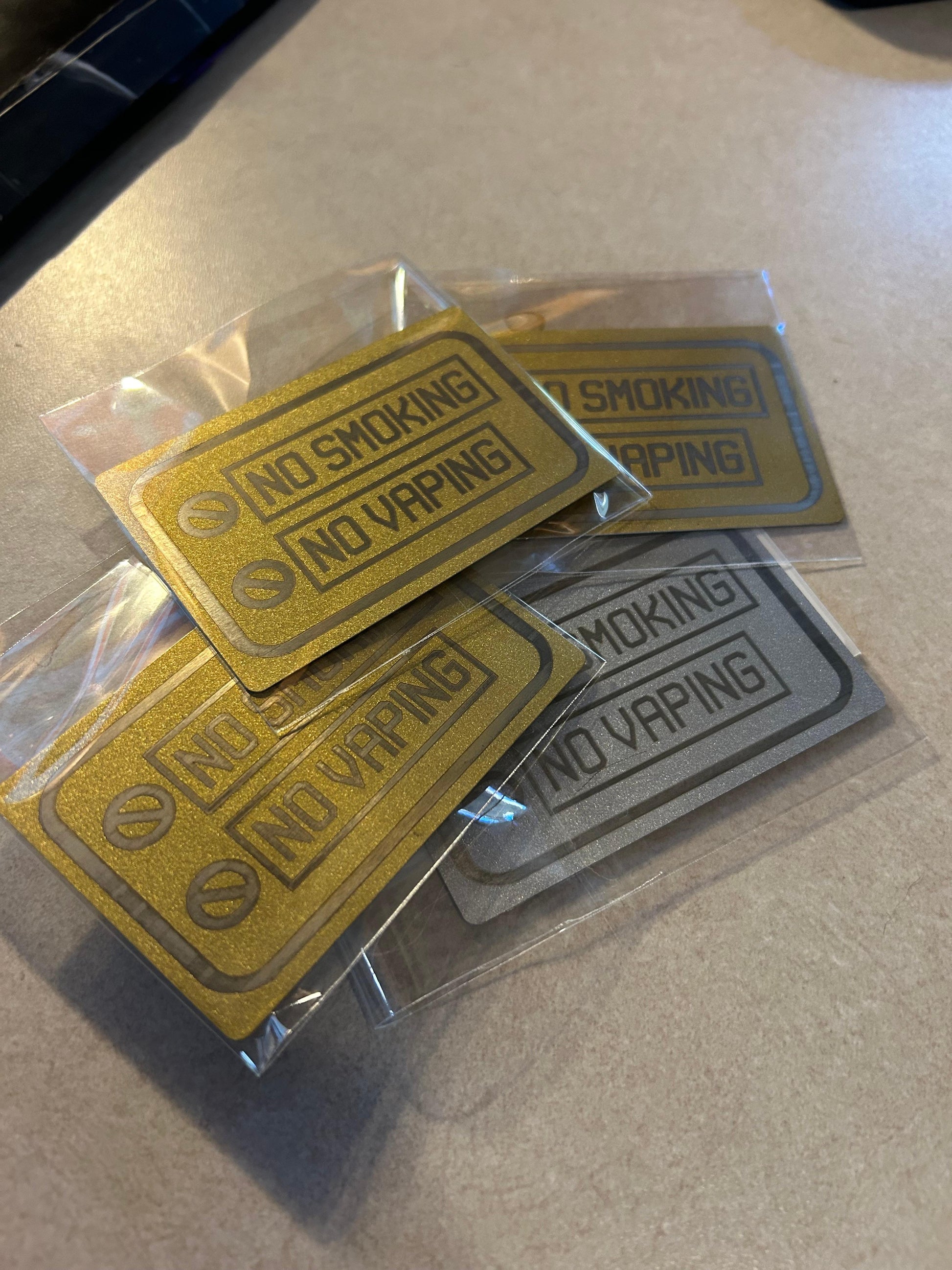 Gold and silver no smoking no vaping laser engraved placards