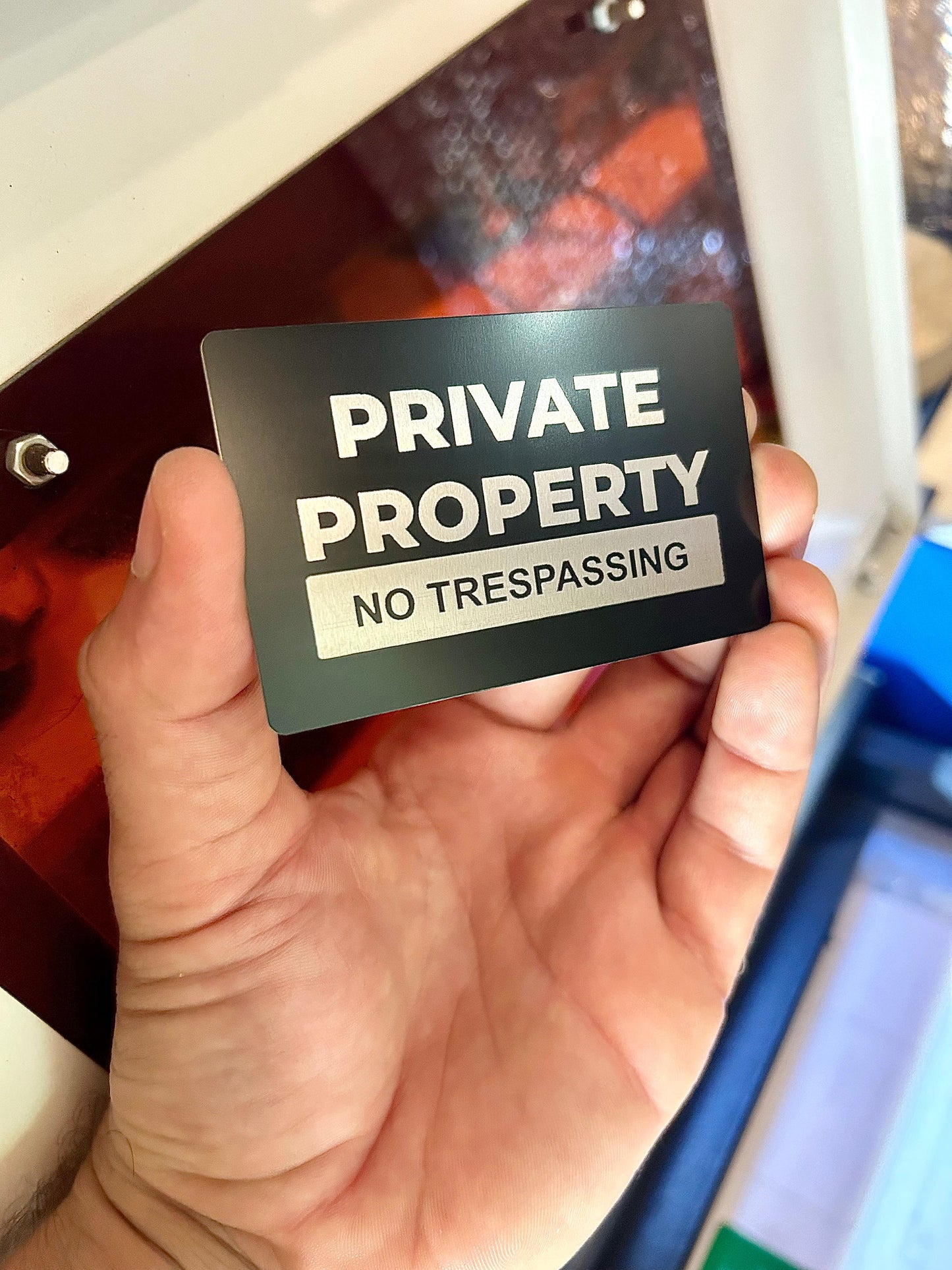 Metal "Private Property, No Trespassing" laser engraved signage in black/silver