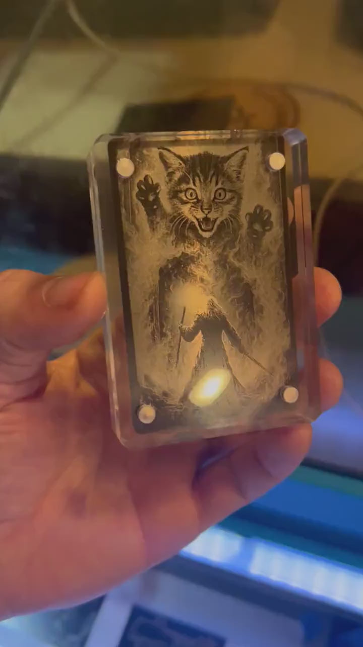 Showcasing a metal fantasy RPG graphic card with giant kitten monster enemy illustration, cute funny gifts for pet lovers