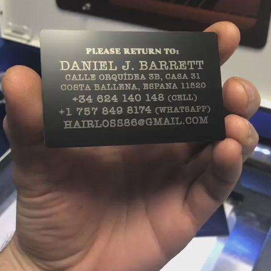 Personalized metal luggage tag with example text engraving