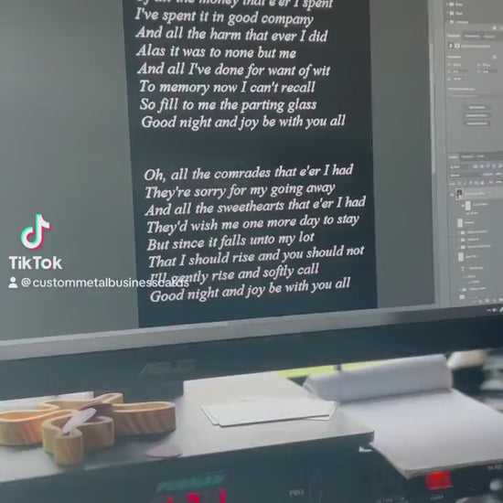 Demonstration of grahpic to 150 metal business cards process for metal prayer cards