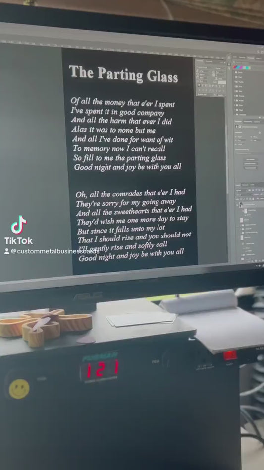 Demonstration of grahpic to 150 metal business cards process for metal prayer cards