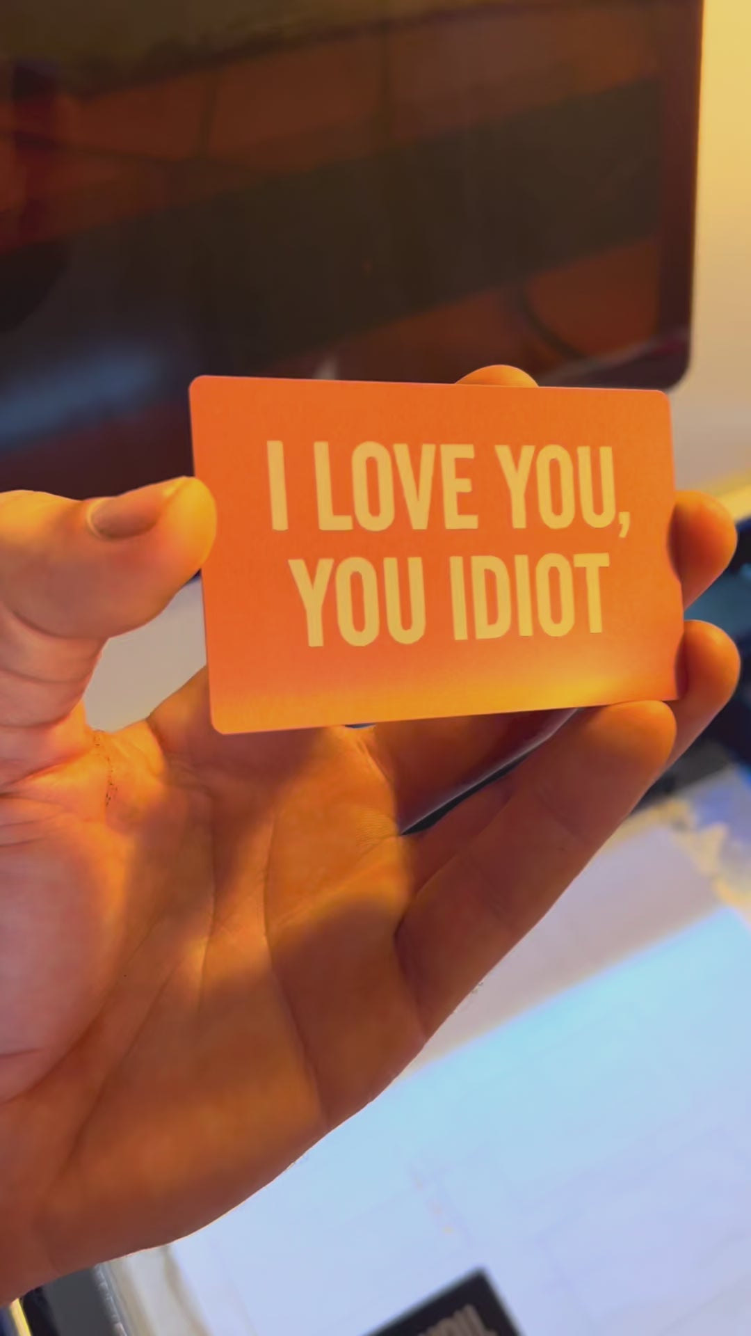 Laser engraved rose gold anodized aluminum romantic gift card with "I love you, You idiot" text