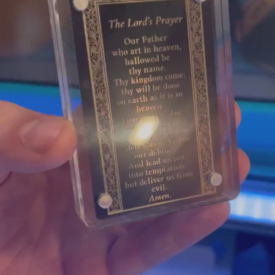 Laser engraved metal "The Lord's Prayer" flash card, shown in black/silver anodized aluminum with optional acrylic display case