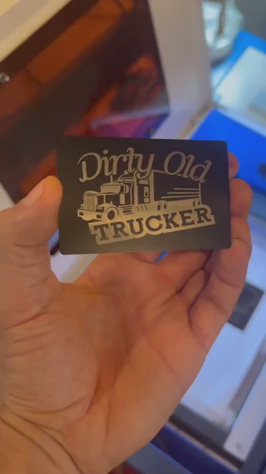 Video of engraved metal Dirty Old Trucker sarcastic gift wallet card turning under light to show reflective finish