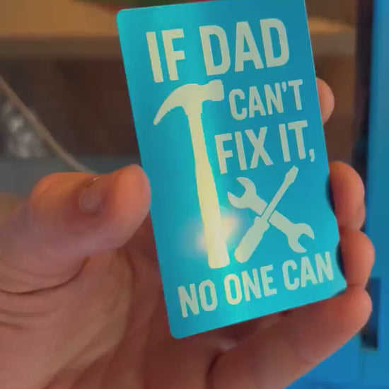 Close-up video of laser engraved metal If Dad Can't Fix It Father's Day keepsake card rotating to show shine and detail