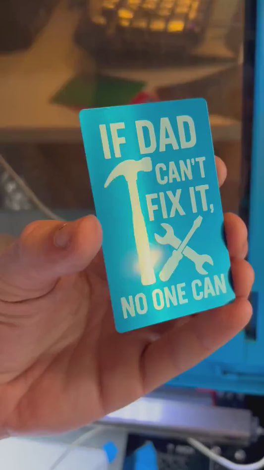 Close-up video of laser engraved metal If Dad Can't Fix It Father's Day keepsake card rotating to show shine and detail